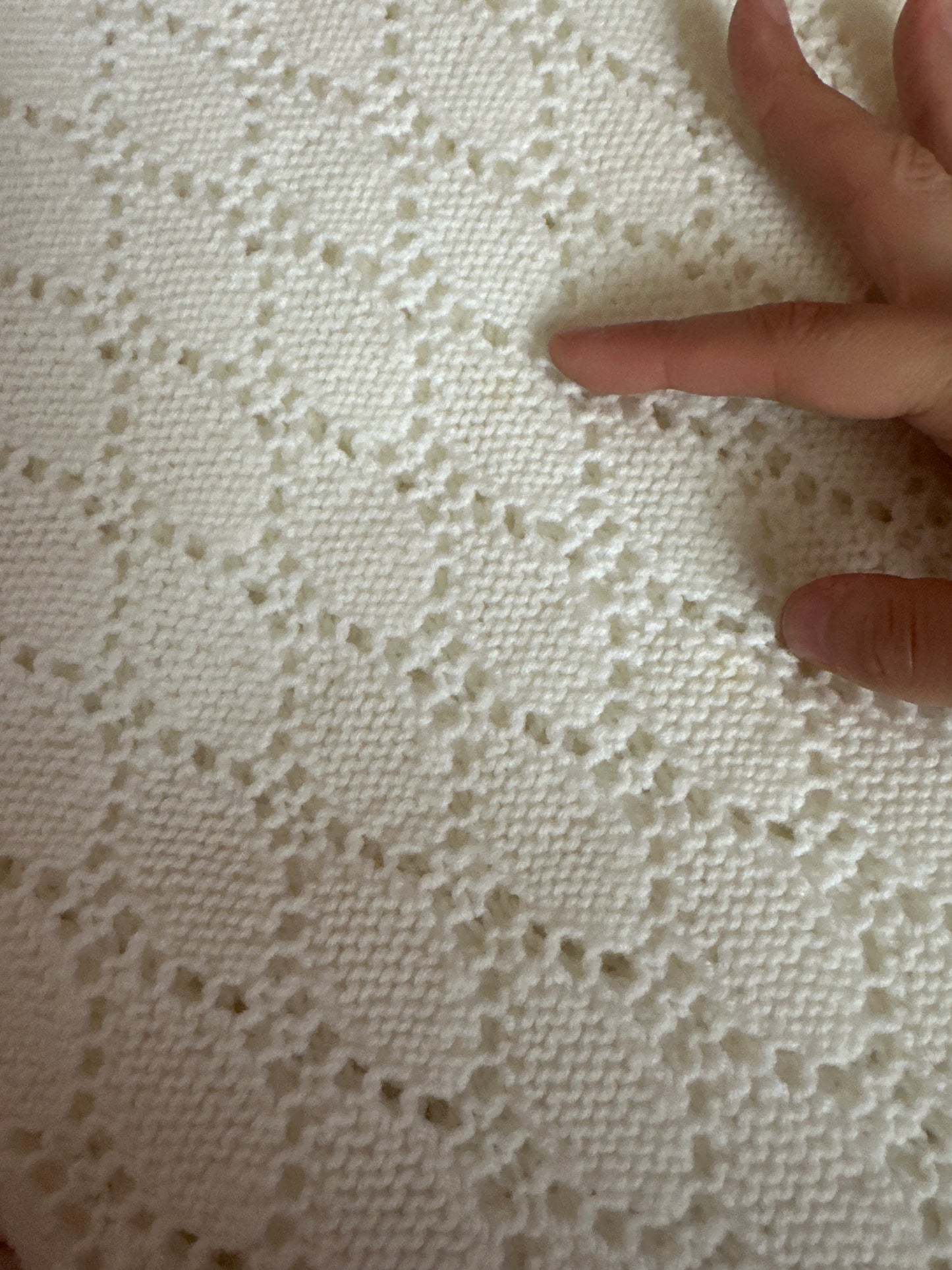 Vintage crocheted pink and white blanket