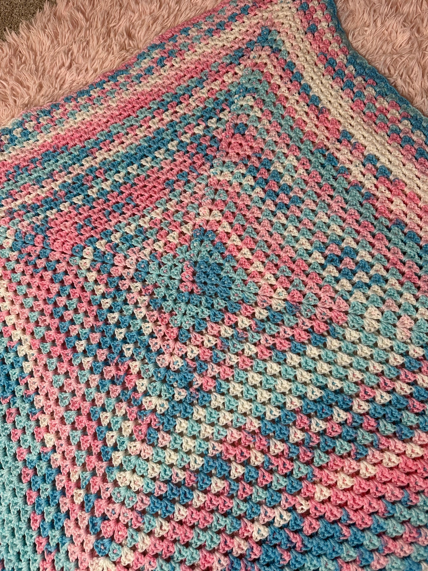 Handmade crocheted square blanket