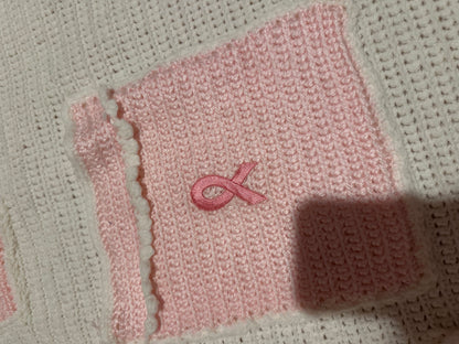 Handmade crocheted, white and pink breast cancer blanket with pockets