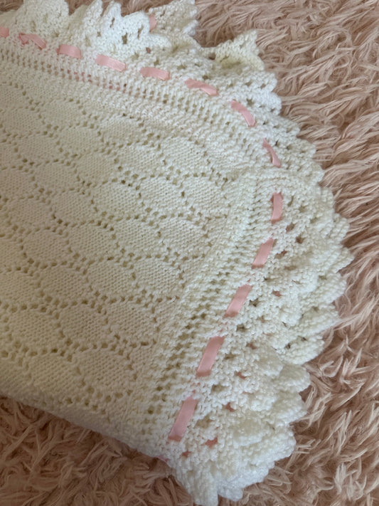 Vintage crocheted pink and white blanket