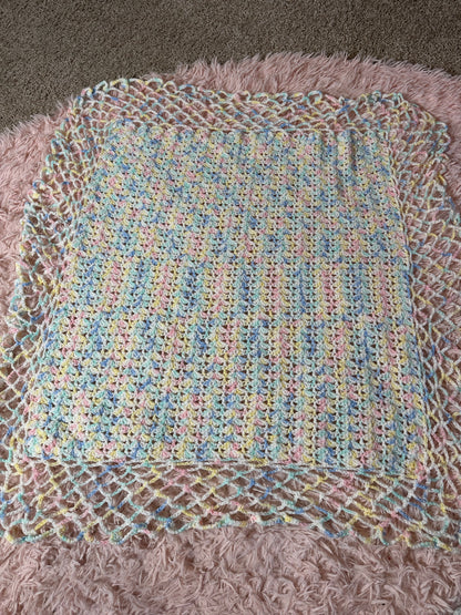 Handmade crocheted pastel blanket