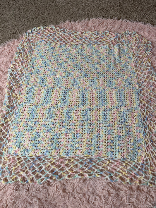 Handmade crocheted pastel blanket