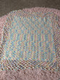 Handmade crocheted pastel blanket