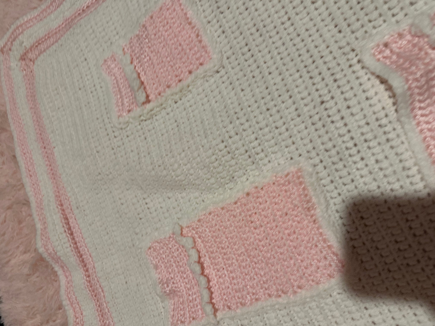 Handmade crocheted, white and pink breast cancer blanket with pockets