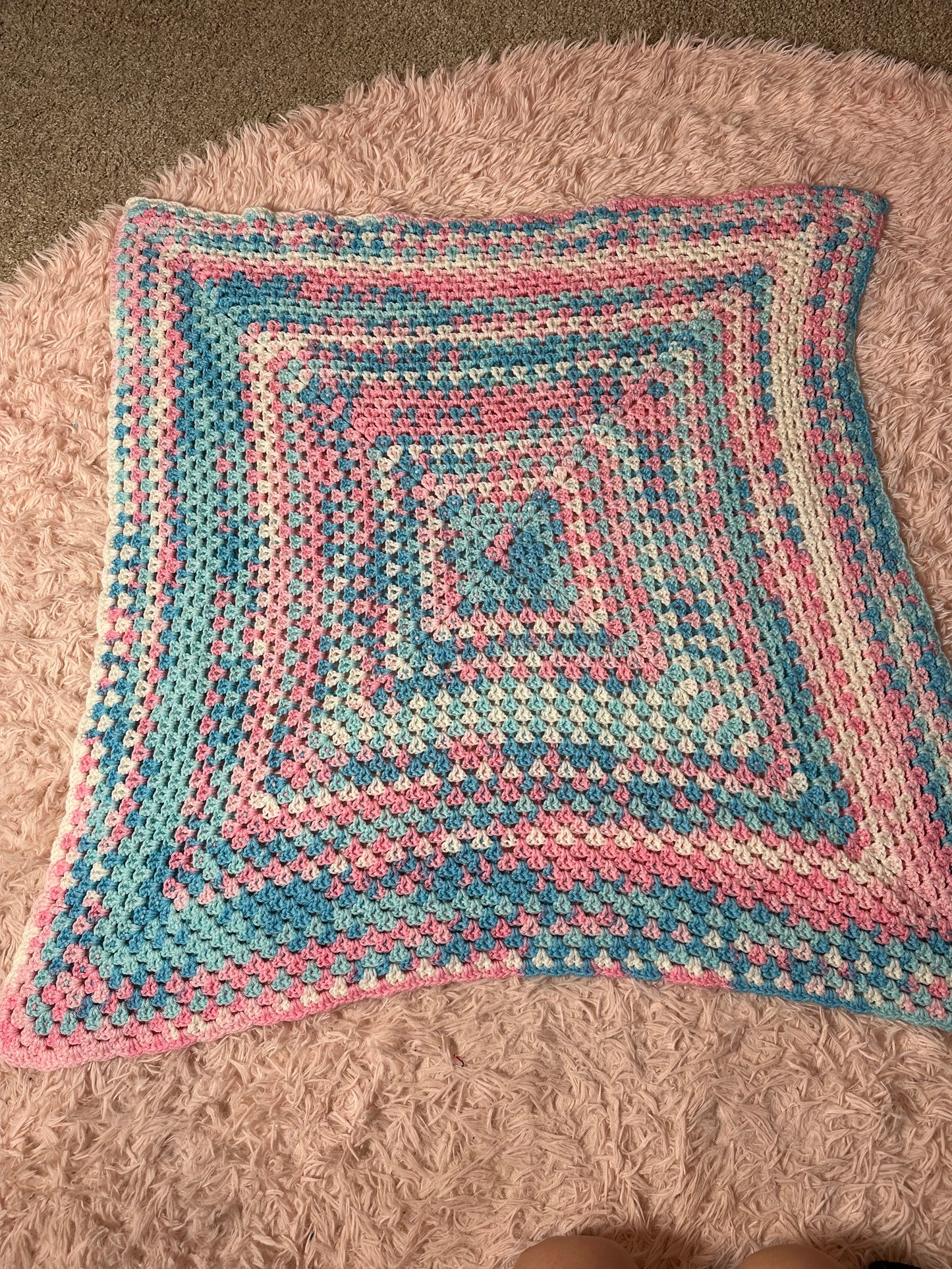 Handmade crocheted square blanket